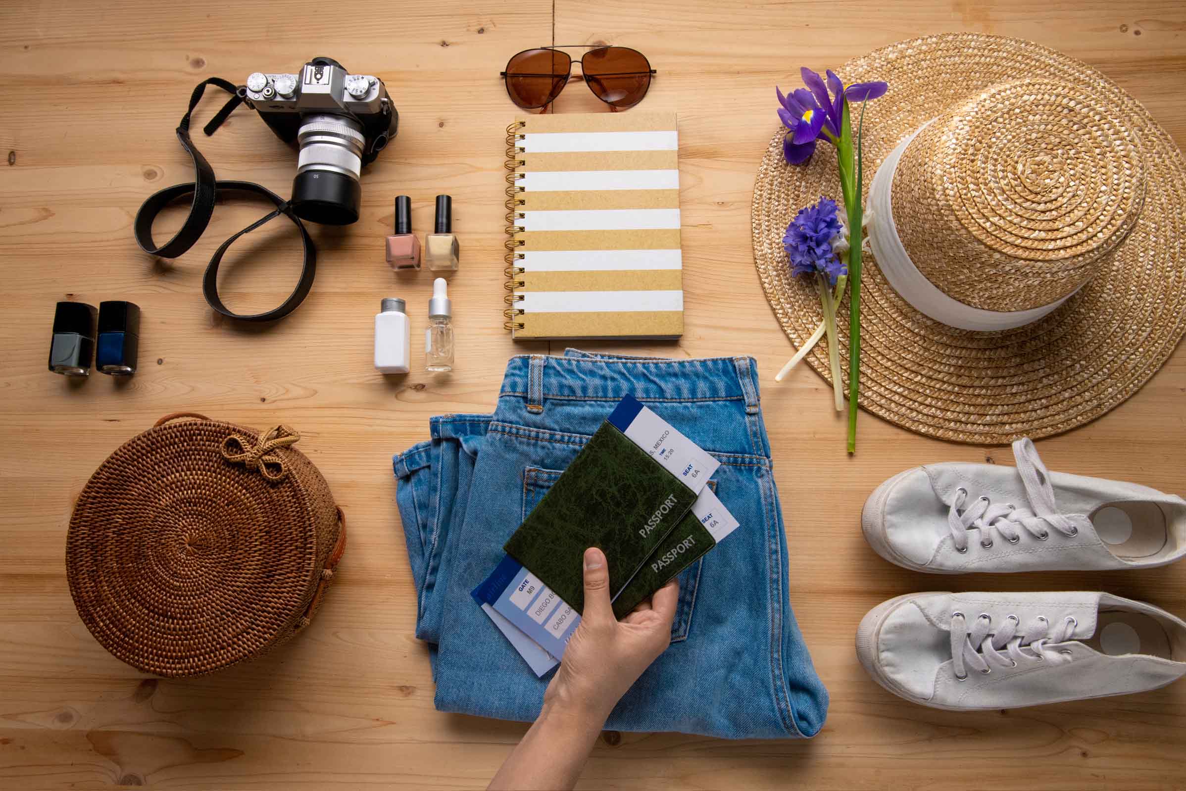Travel planning desk with passport and notebook