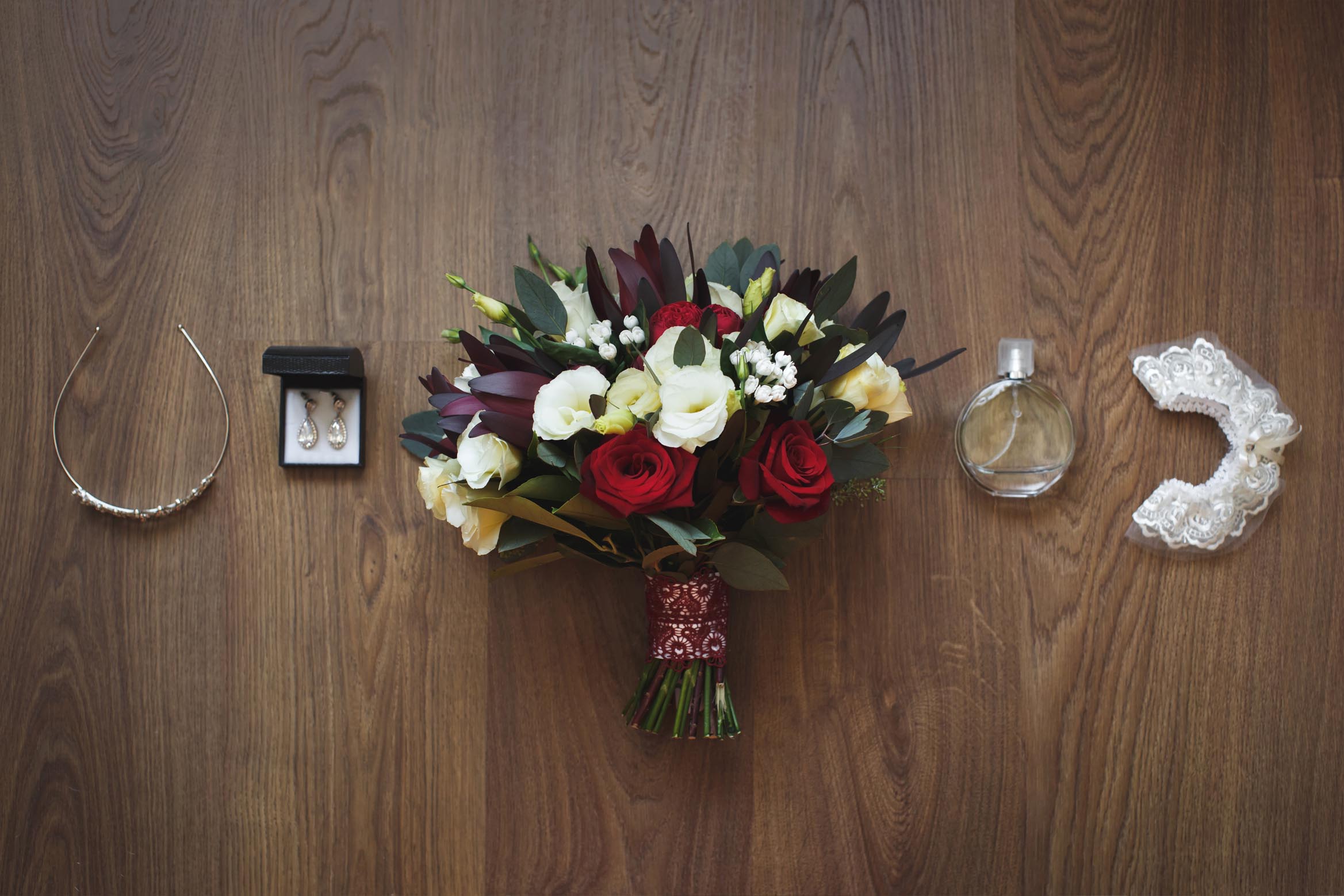 Wedding flatlay with bouquet and invitations